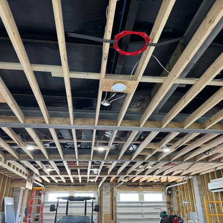 New wood ceiling joists framed in a garage