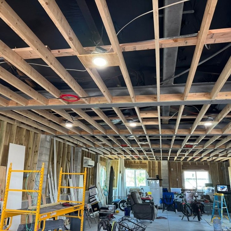 Wood ceiling joists framed inside a home